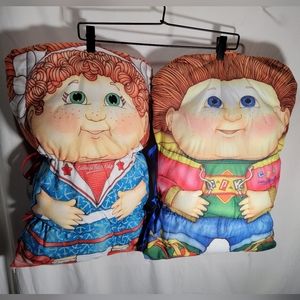 2 vintage 1991 Cabbage Patch kids pillows 1 boy and 1 girl in amazing condition.